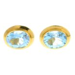 A pair of blue topaz stud earrings.Stamped 750.