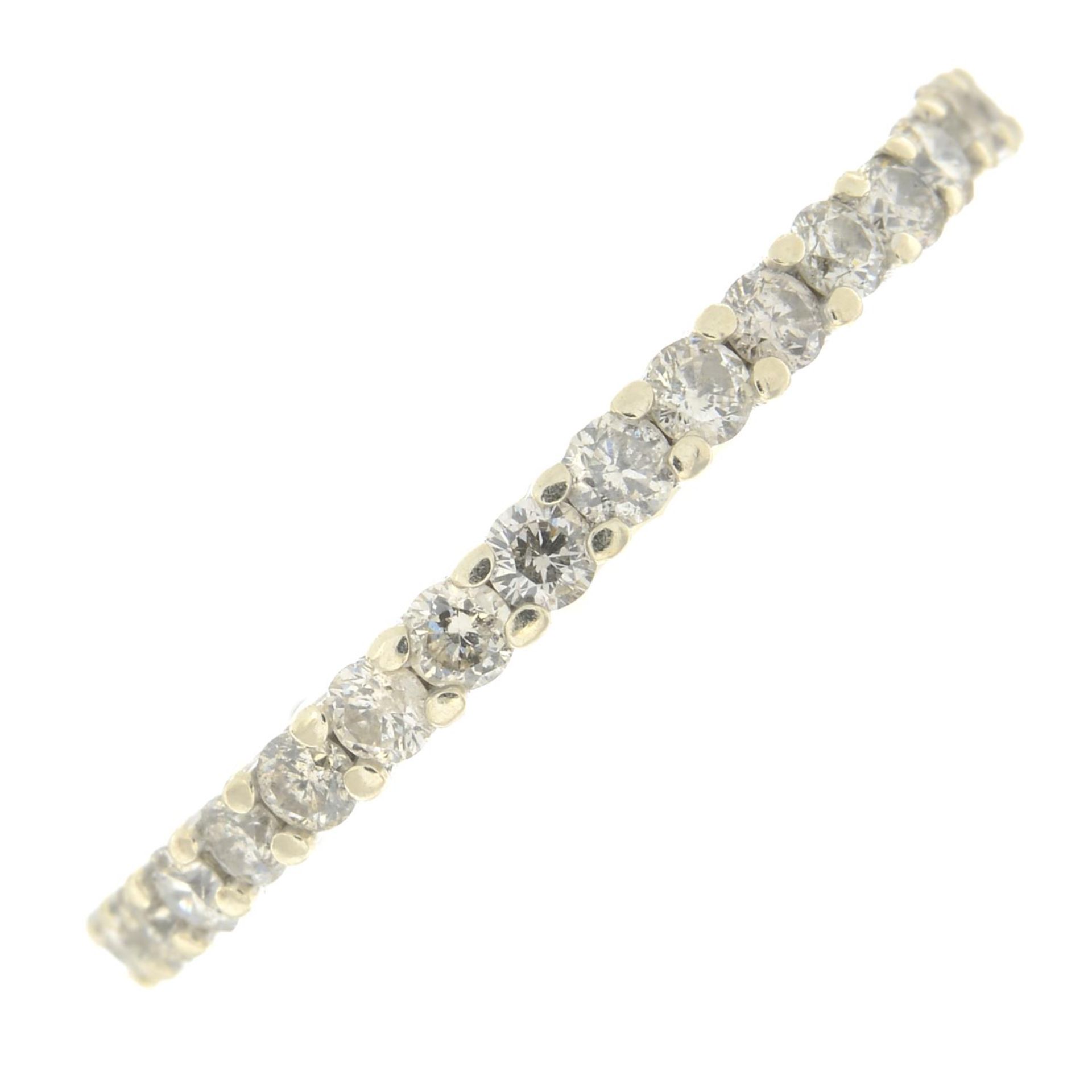 A diamond full eternity ring.Estimated total diamond weight 1.40cts.