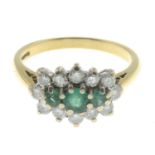 An 18ct gold emerald and diamond dress ring.Estimated total diamond weight 0.80ct.