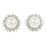 A pair of 14ct gold cultured pearl and vari-cut diamond cluster earrings.Cultured pearls measuring