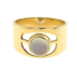 A mid 20th century gold moonstone dress ring.Hallmarks for London, 1970.