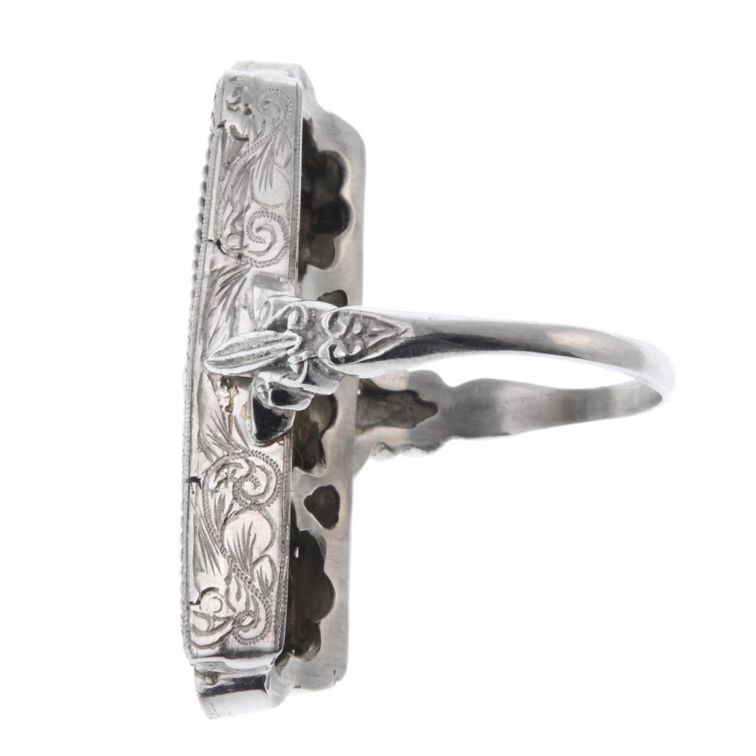 An early 20th century platinum diamond dress ring.Estimated total diamond weight 0.75ct. - Image 3 of 3