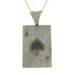 A diamond and black gem pendant,