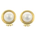 A pair of 18ct gold mabe pearl earrings.Hallmarks for 18ct gold.