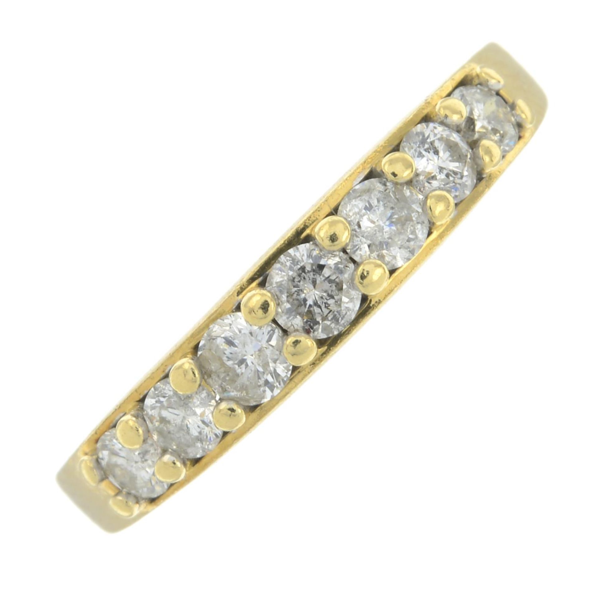 An 18ct gold brilliant-cut diamond half eternity ring.Estimated total diamond weight 0.40ct,