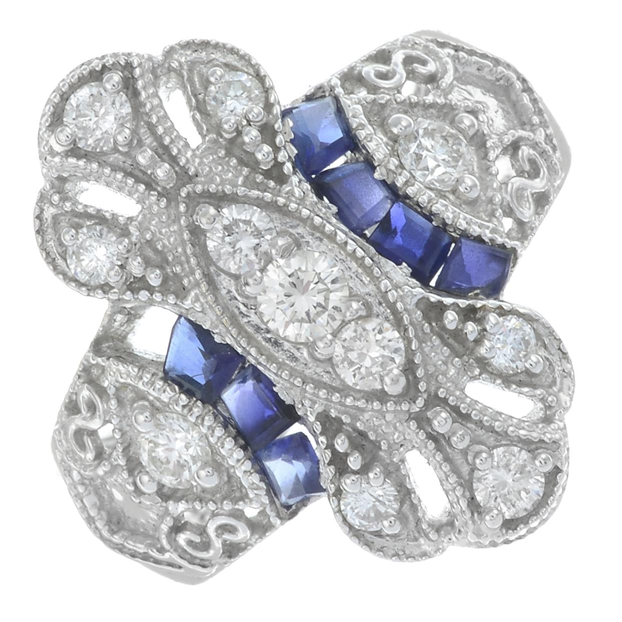 A sapphire and diamond dress ring.One sapphire deficient.