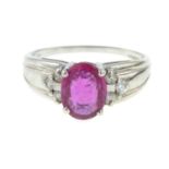 A 9ct gold ruby and diamond ring.Estimated total diamond weight 0.10ct.