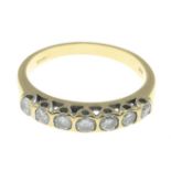An 18ct gold diamond seven-stone ring.Estimated total diamond weight 0.60ct.Hallmarks for 18ct