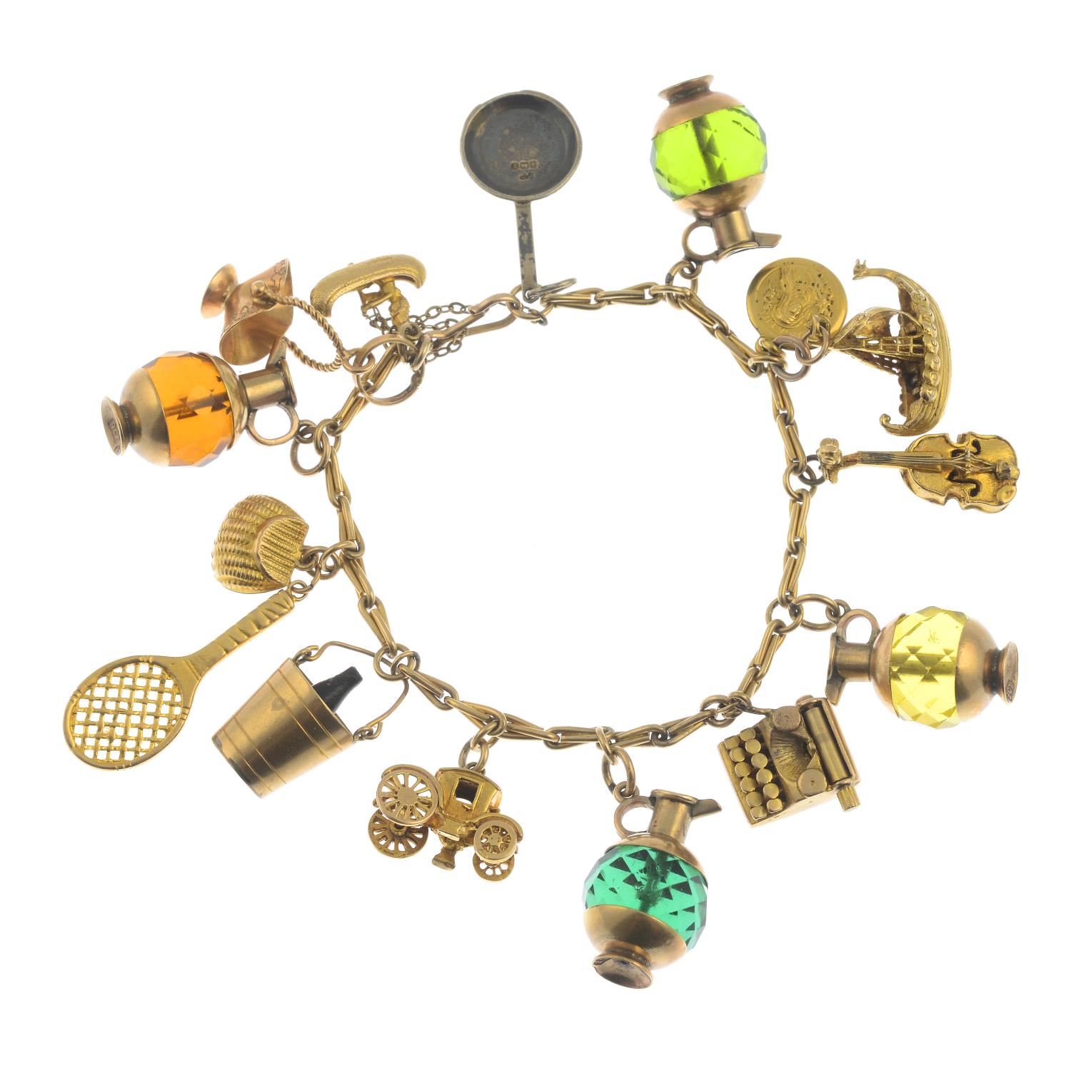 A charm bracelet, suspending thirteen charms.Some with marks to indicate 9ct gold.