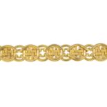 A 9ct gold textured and polished fancy-link bracelet.Hallmarks for 9ct gold.