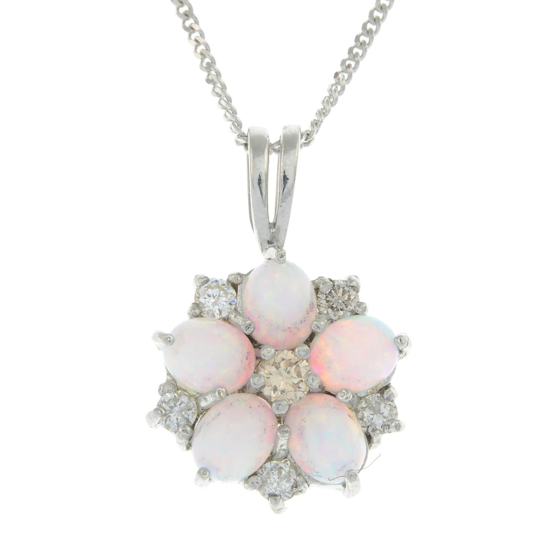 A 9ct gold diamond and synthetic opal cluster pendant,