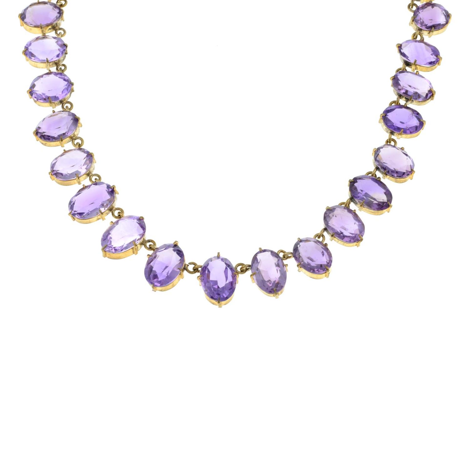 An amethyst necklace.Length 46.5cms.