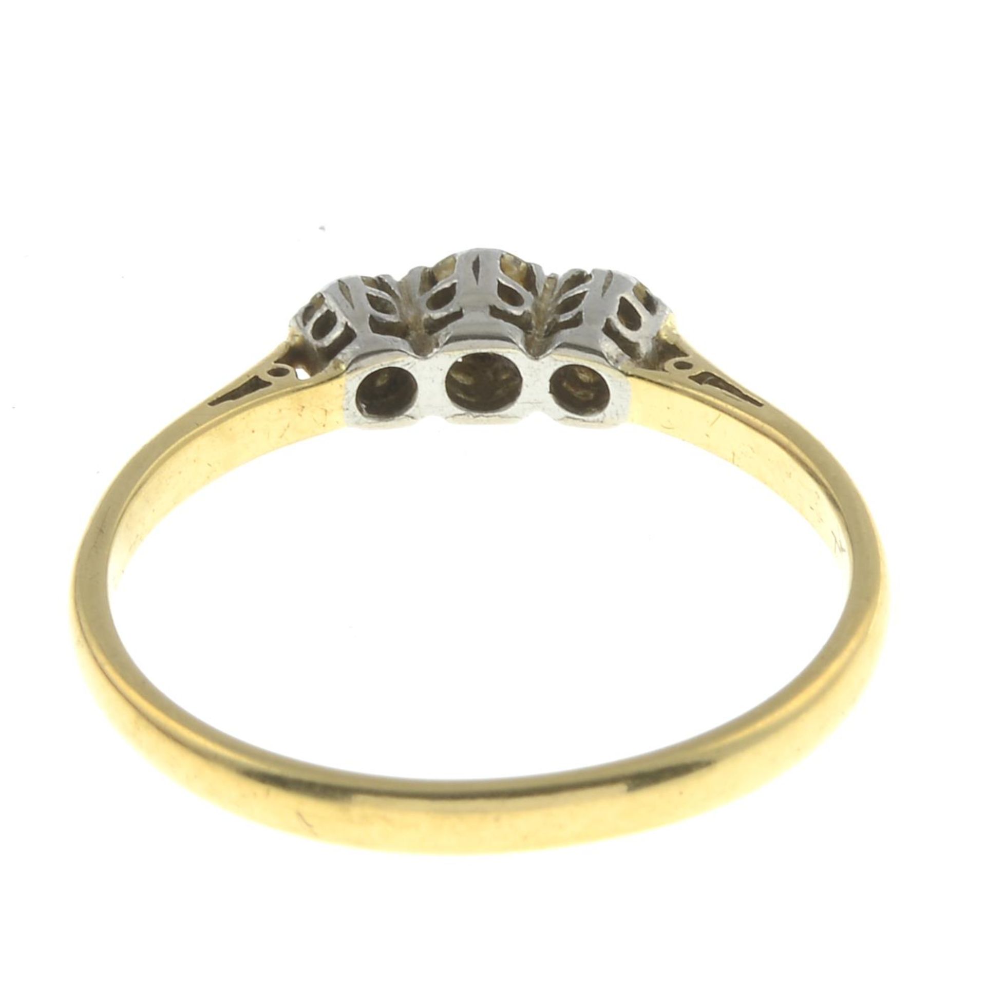 A brilliant-cut diamond three-stone ring.Estimated total diamond weight 0.25ct, - Image 2 of 2