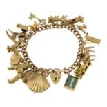 A mid 20th century 9ct gold charm bracelet,