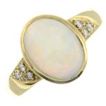 An opal and diamond ring.Estimated total diamond weight 0.10ct.