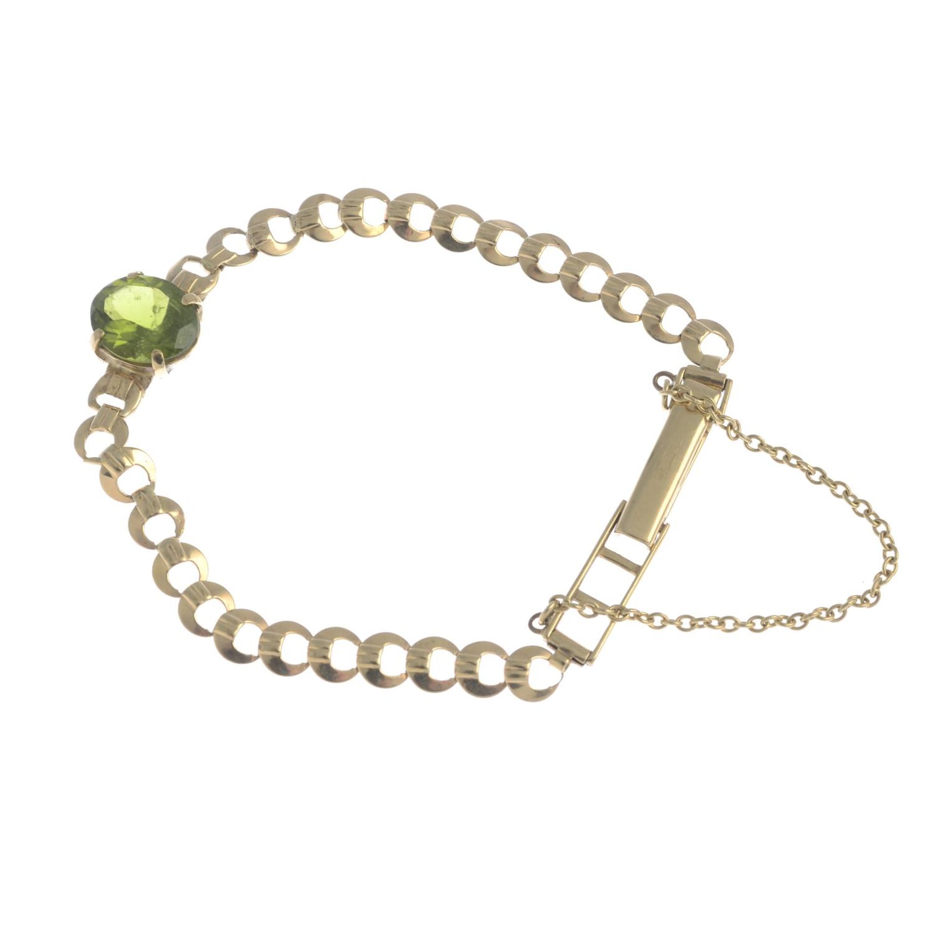 A 9ct gold peridot bracelet.Hallmarks for Birmingham, 1963.Length 16.5cms. - Bild 2 aus 3