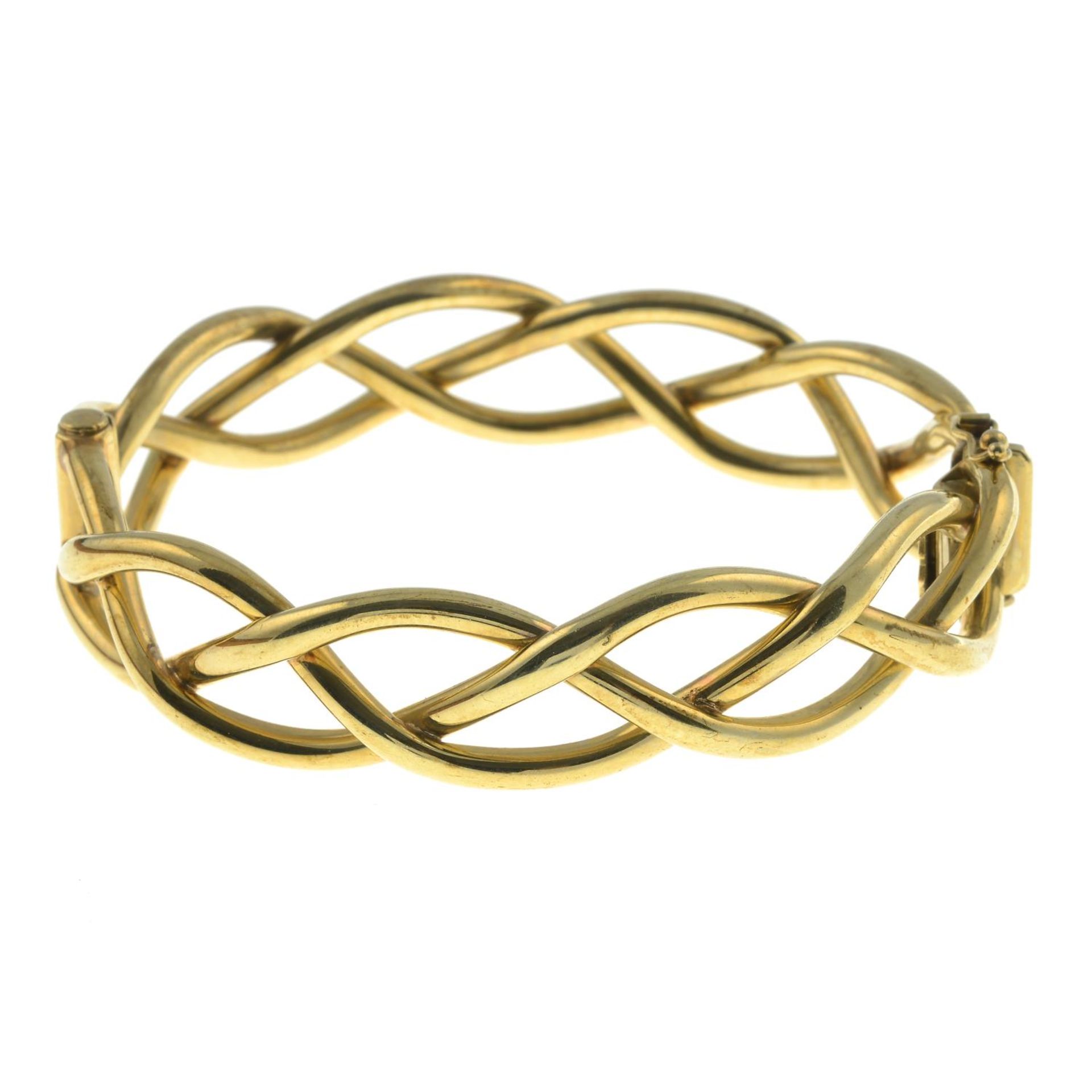 A 9ct gold woven bangle.Hallmarks for 9ct gold.