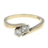 An 18ct gold diamond two-stone ring.Total diamond weight 0.33ct,