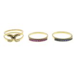 A set of diamond, ruby and sapphire interchangeable rings.Estimated total diamond weight 0.15ct.