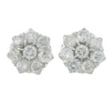 A pair of diamond cluster earrings.Estimated total diamond weight 1.10cts.