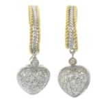 A pair of diamond heart drop bi-colour earrings.Estimated total diamond weight 0.20ct.Length