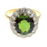 A green tourmaline and single-cut diamond cluster ring.Estimated total diamond weight 0.40ct.