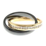 A brilliant-cut diamond interlocking band ring.Estimated total diamond weight 0.85ct,