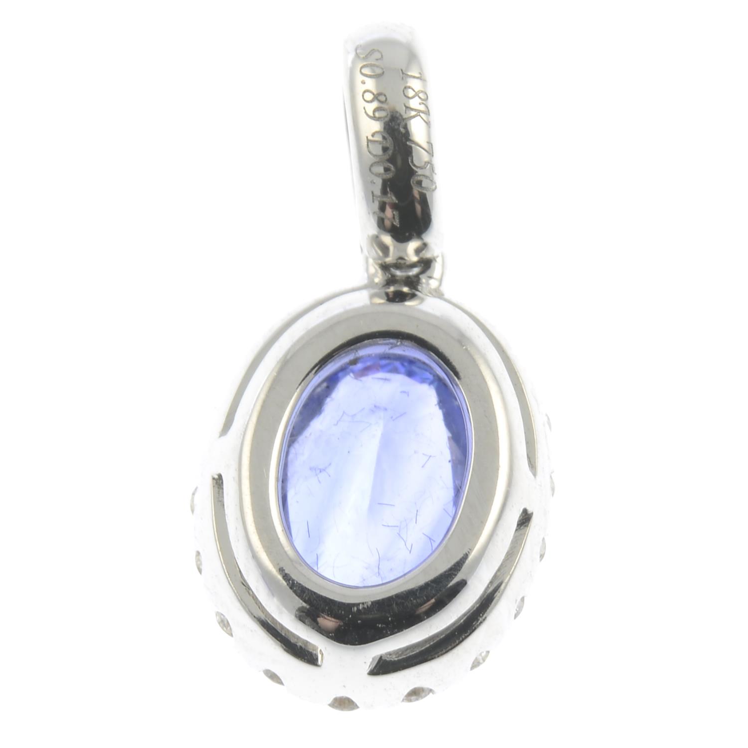 A diamond and sapphire cluster pendant.Sapphire weight 0.89ct. - Image 2 of 2