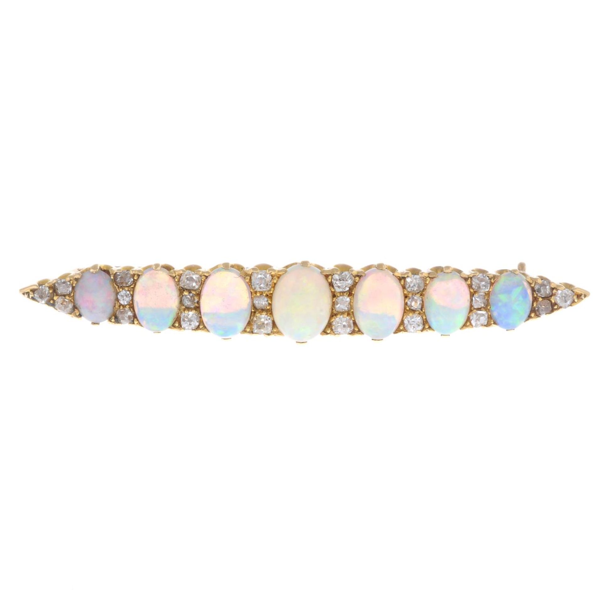 An early 20th century gold opal and diamond brooch.Estimated total diamond weight 0.35ct.