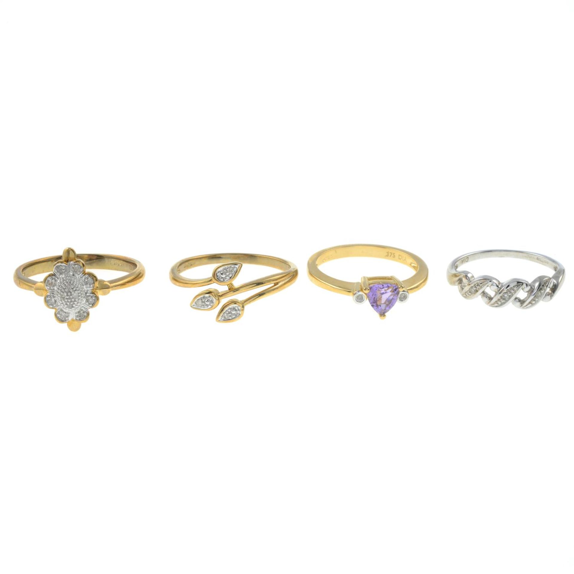 9ct gold amethyst and diamond three-stone ring, hallmarks for 9ct gold, ring size K, 2gms.