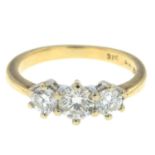 A diamond three-stone ring.Total diamond weight 0.75ct,