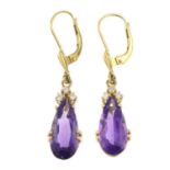 A pair of amethyst and diamond earrings.Estimated total diamond weight 0.10ct.