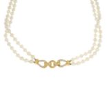 A cultured pearl two-row necklace, with diamond panel highlight.