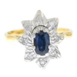 A sapphire and diamond cluster ring.Stamped 18CT.