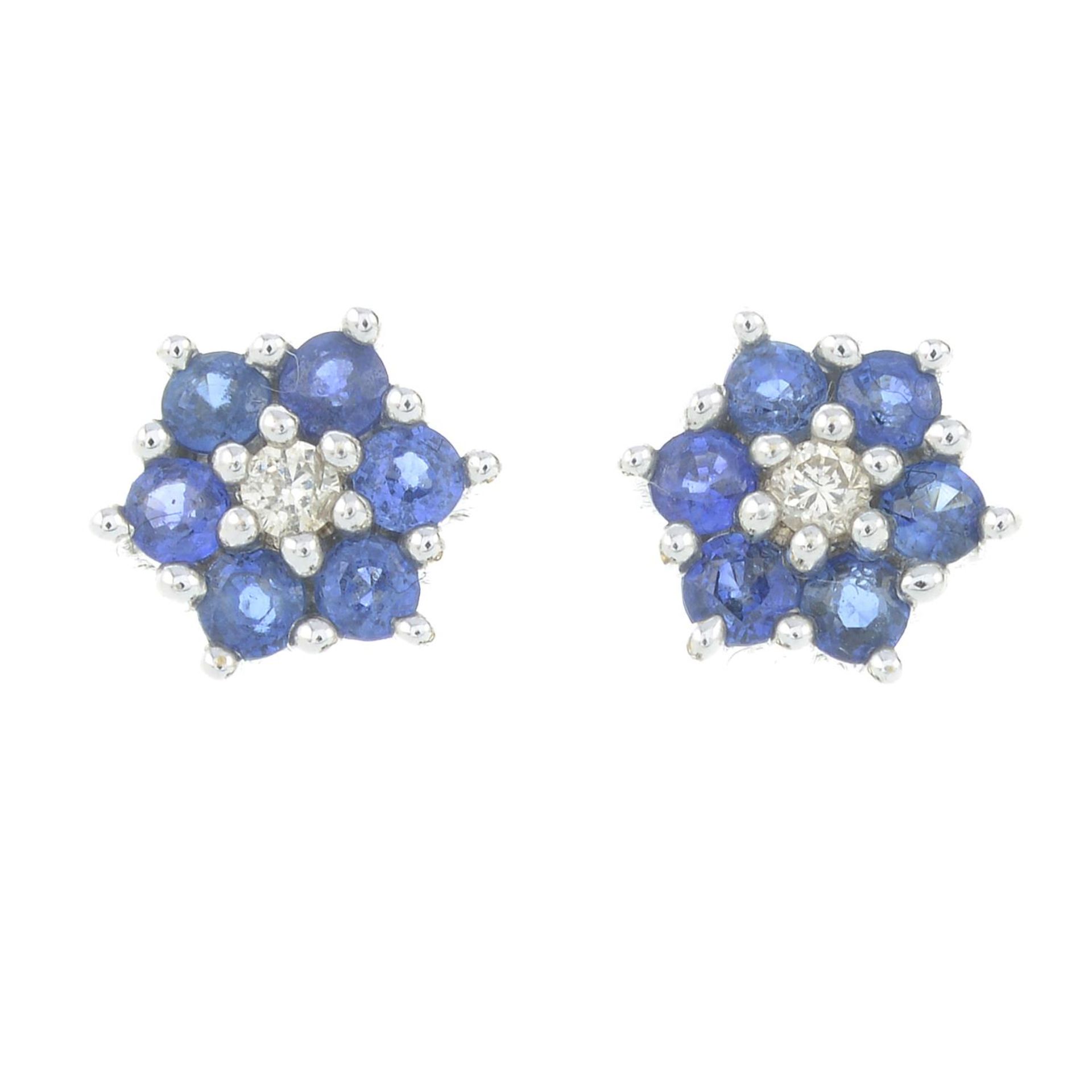 Sapphire and diamond cluster earrings, stamped 9K, length 0.9cm, 2.4gms.