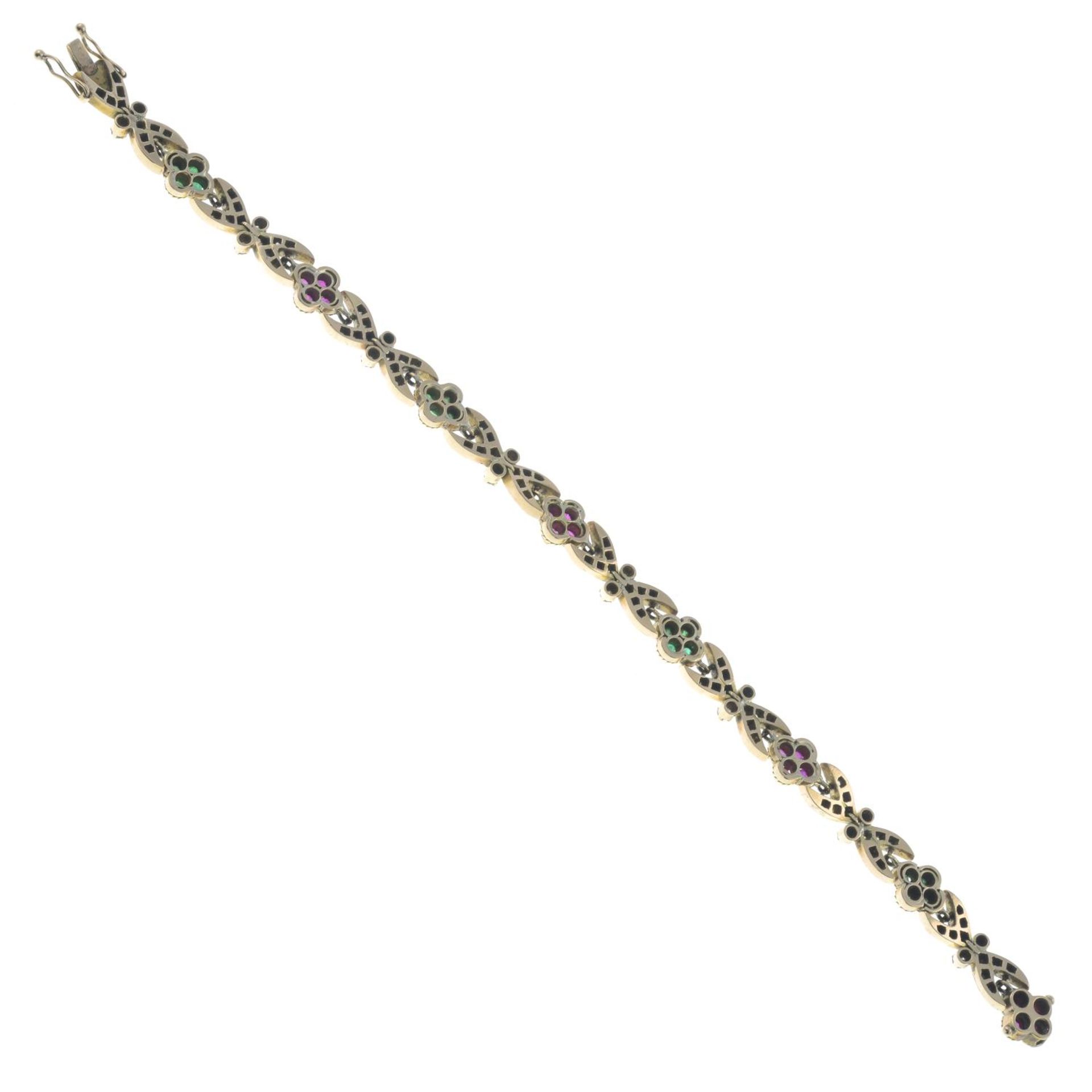 A brilliant-cut diamond and gem-set bracelet.Gems include emerald and synthetic ruby.Estimated - Image 3 of 3