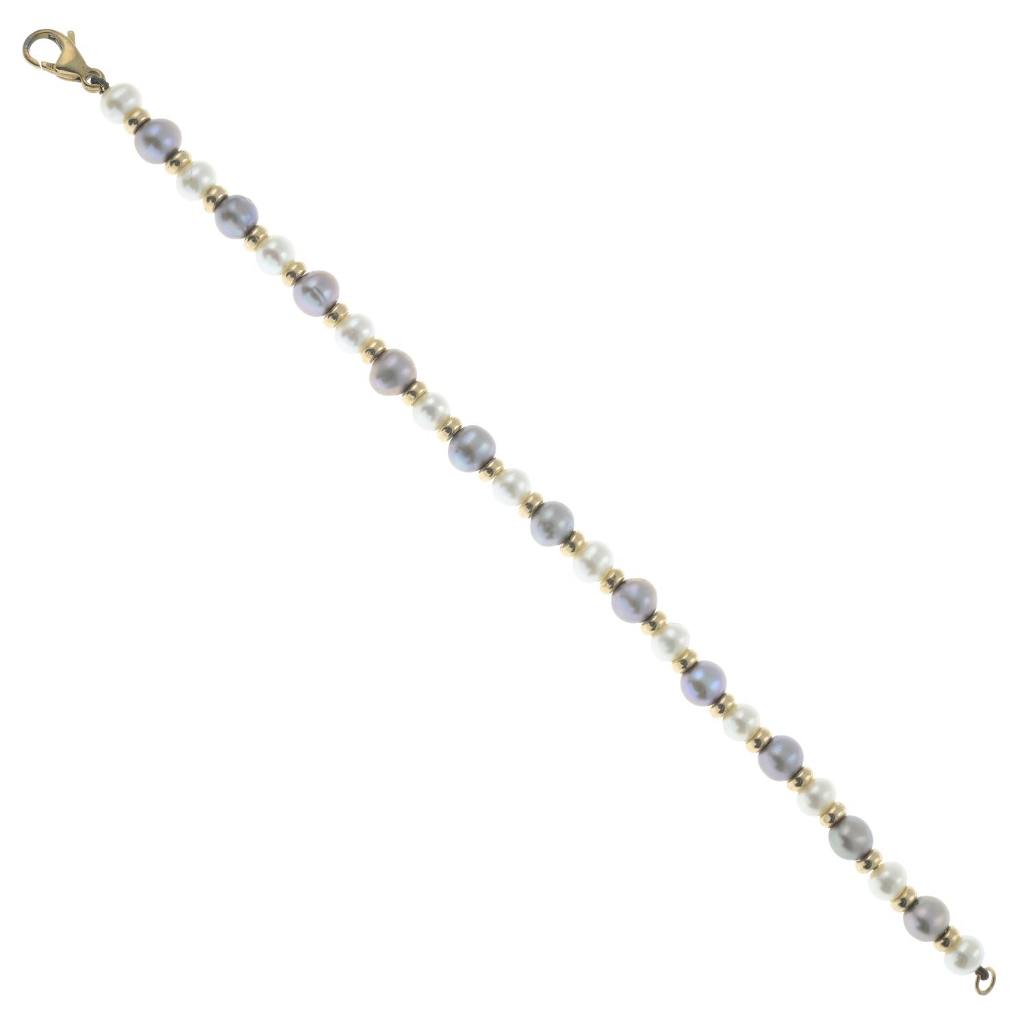 A cultured pearl bracelet, with polished bead spacers.Clasp stamped 9K 375. - Image 2 of 2