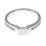 A platinum diamond ring.Principal diamond with report 14954294,