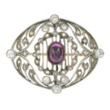 An Edwardian gold and platinum ruby and diamond brooch.Length 3cms.