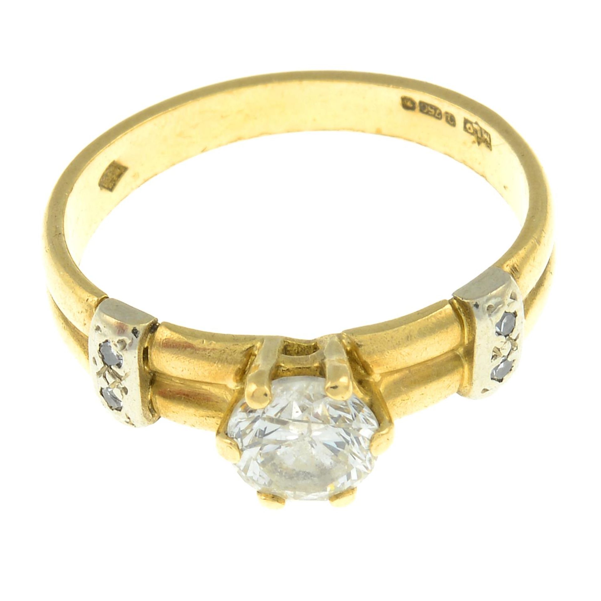 An 18ct gold diamond ring.Estimated total diamond weight 0.60ct,