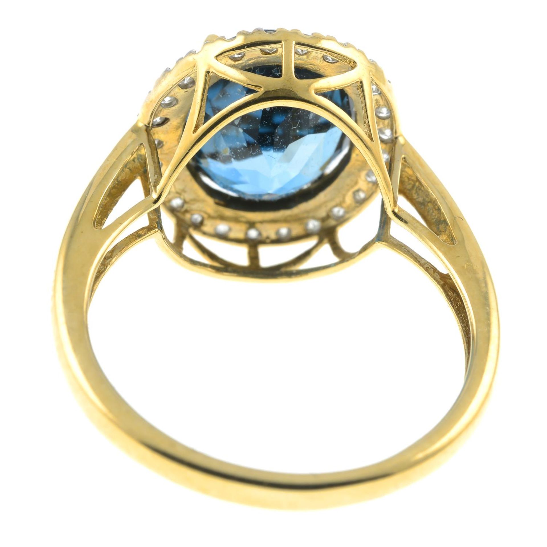 A 9ct gold blue topaz and single-cut diamond cluster ring.Estimated total diamond weight 0.20ct. - Image 2 of 2