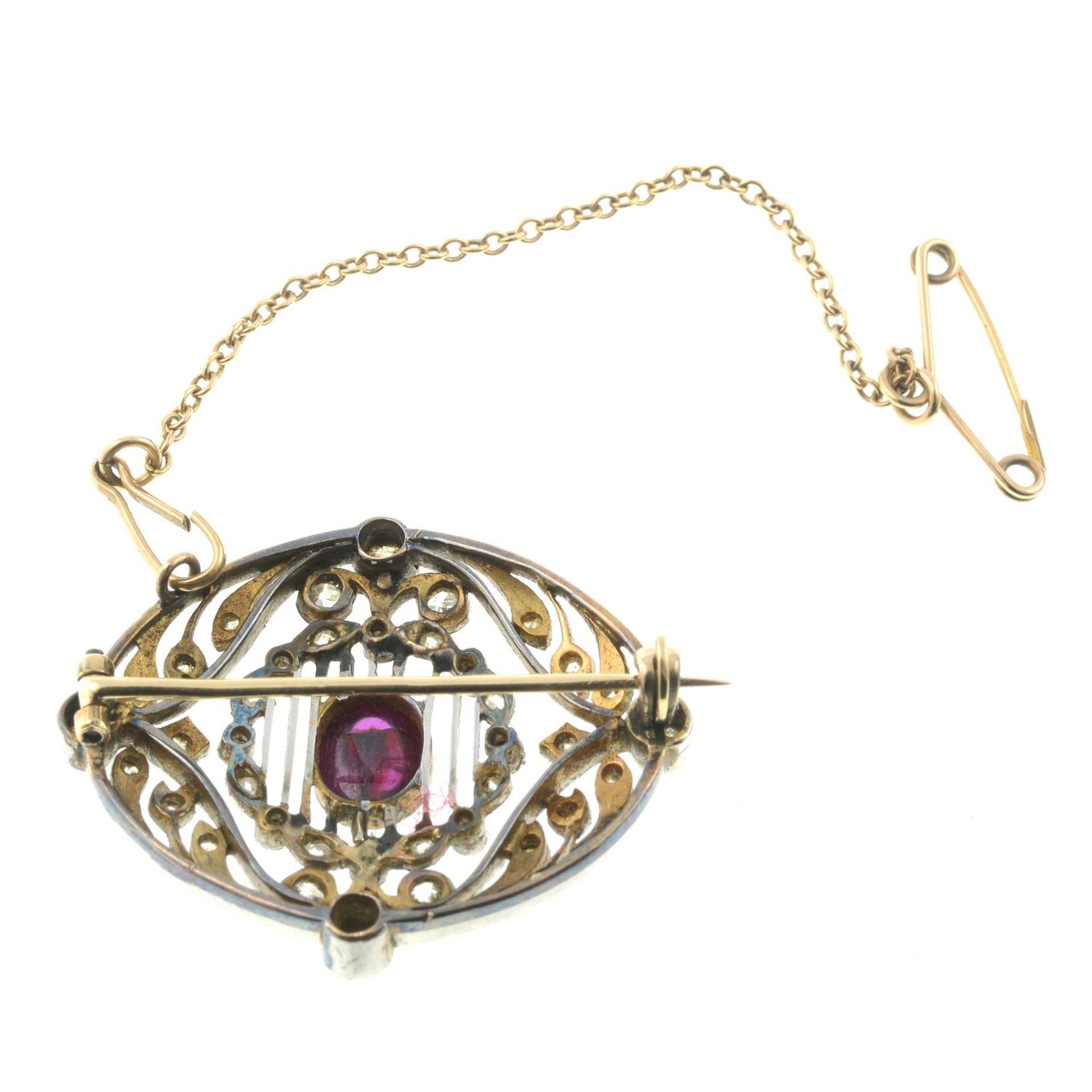 An Edwardian gold and platinum ruby and diamond brooch.Length 3cms. - Image 2 of 2