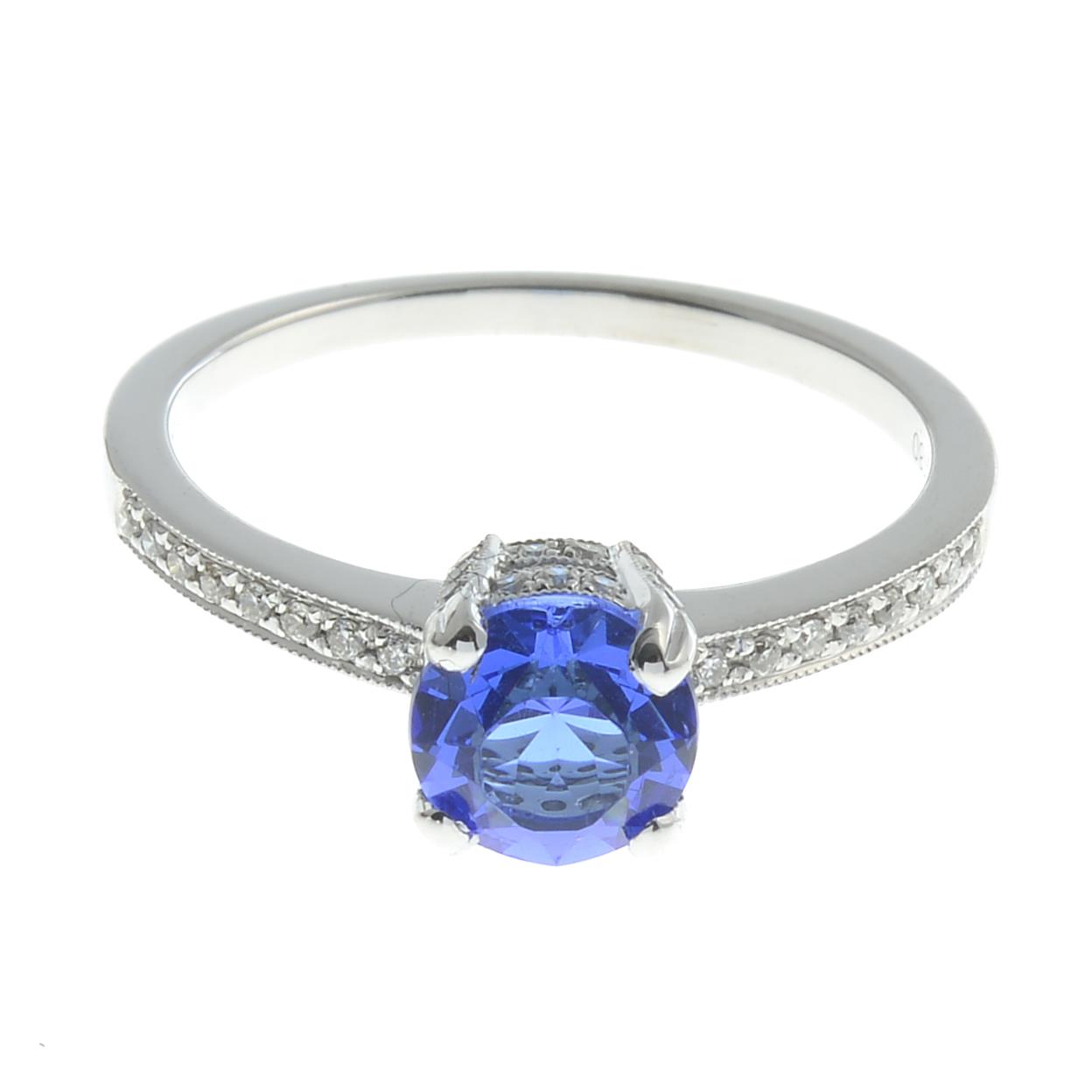 A blue paste and diamond ring.Total diamond weight 0.18ct,