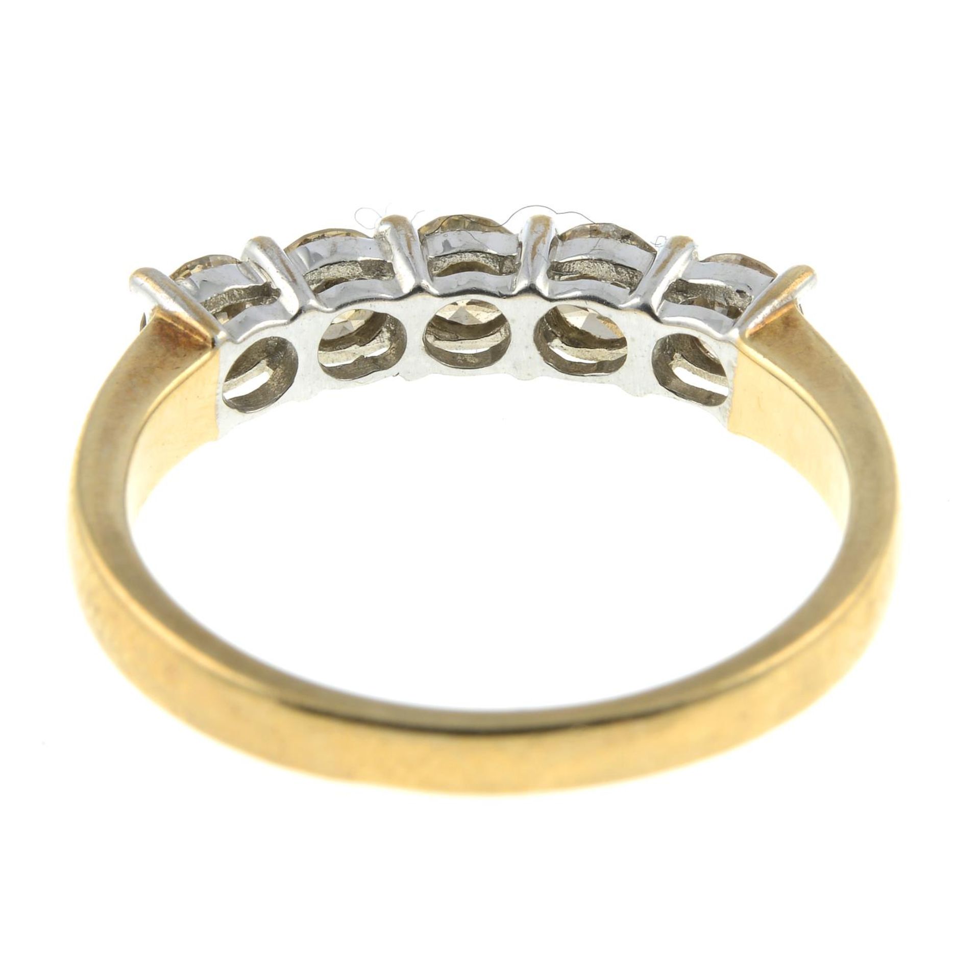 A 9ct gold diamond five-stone ring.Estimated total diamond weight 1ct, tinted colour, P1 clarity. - Bild 2 aus 2