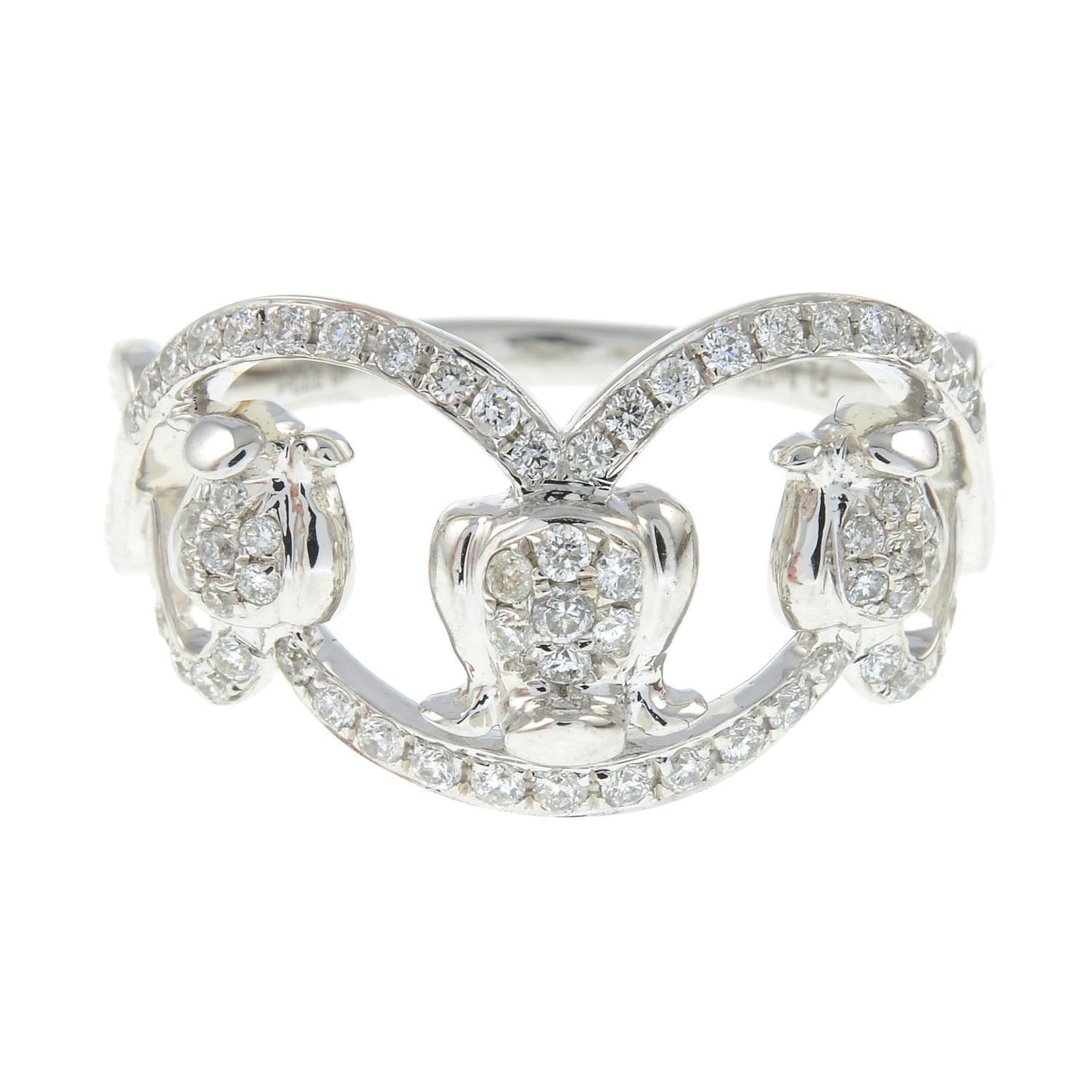 A 9ct gold brilliant-cut diamond floral dress ring.Total diamond weight 0.33ct, stamped to band.