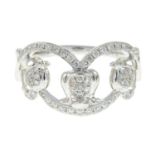 A 9ct gold brilliant-cut diamond floral dress ring.Total diamond weight 0.33ct, stamped to band.