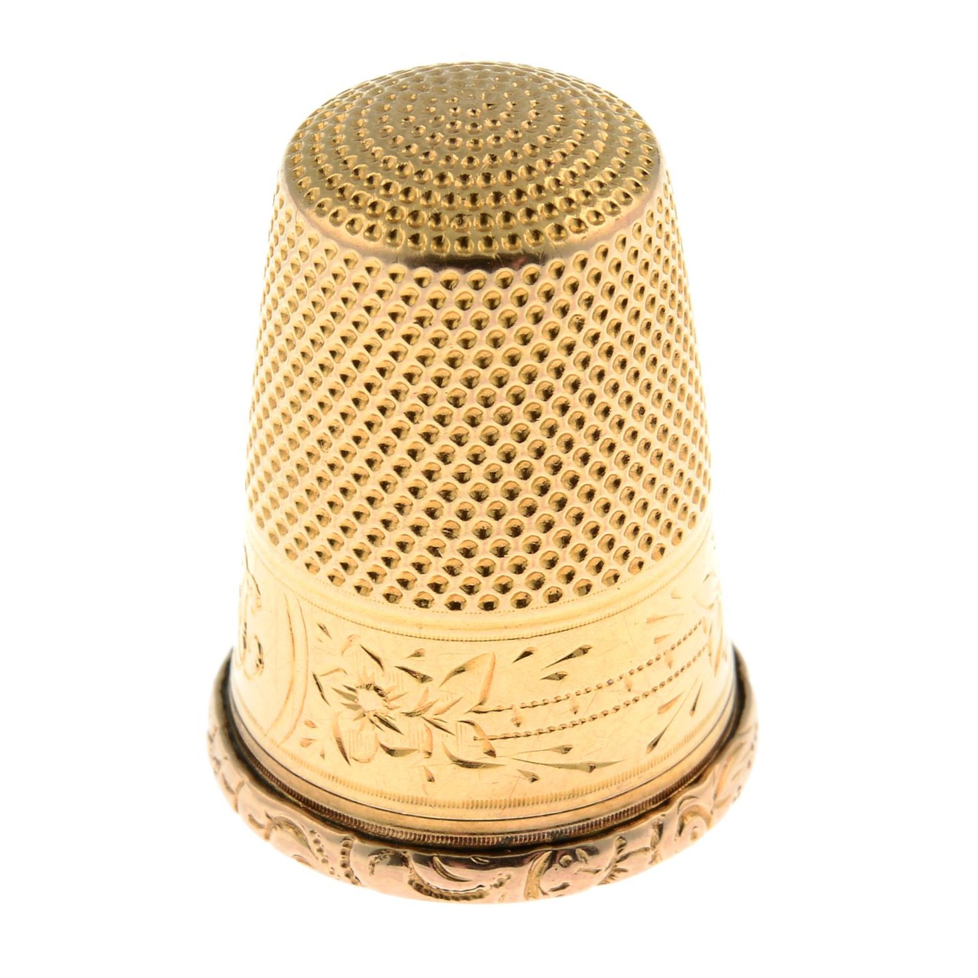 An early 20th century gold thimble.Length 2.3cms.