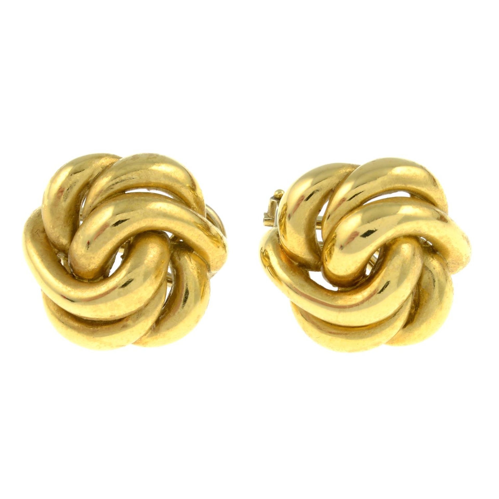 A pair of 18ct gold knot earrings.Import marks for Sheffield, 1990.Length 2cms.