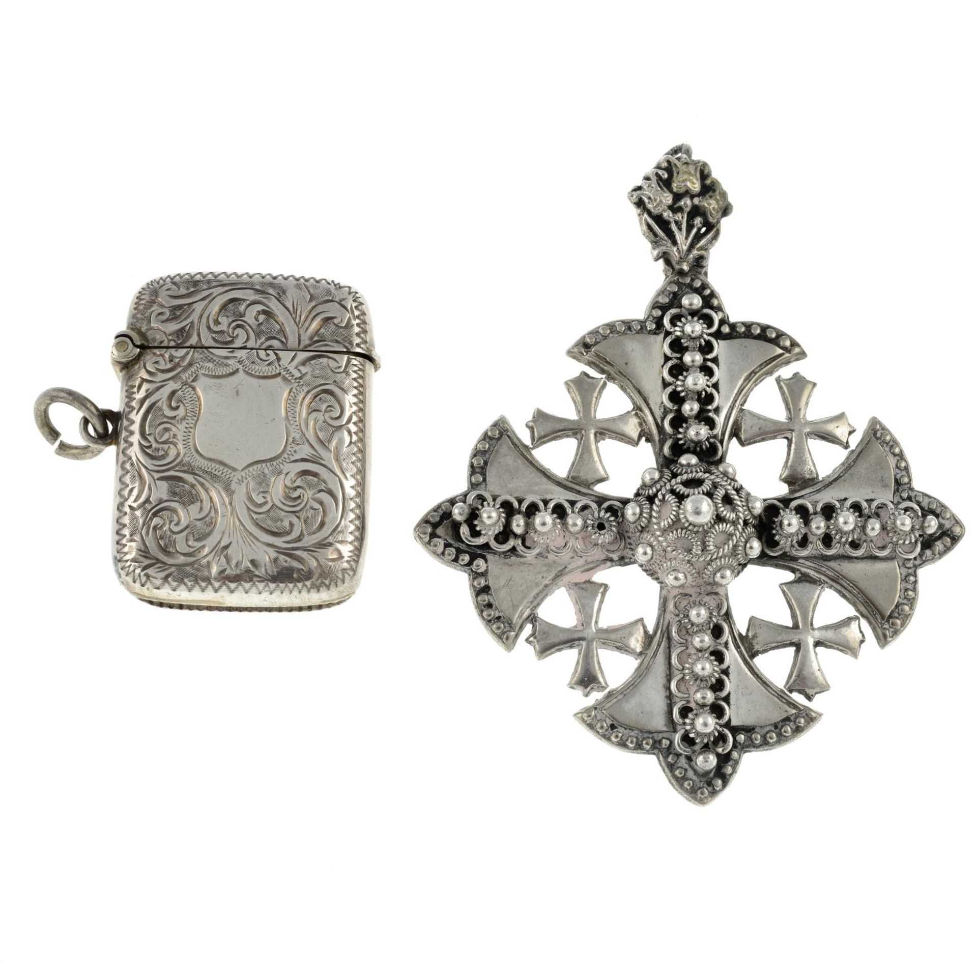 A silver vesta case and a cross pendant.Stamps for silver.Length of vesta 4.0cms.