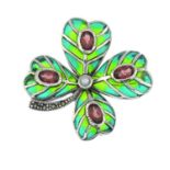 A plique-a-jour enamel clover brooch with garnet,